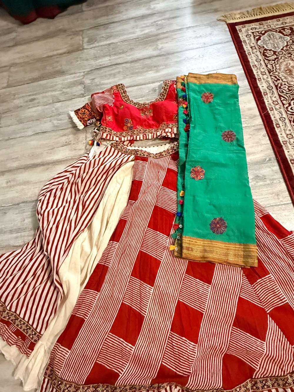 Traditional Red and White Printed Women’s Skirt Set with Green Dupatta